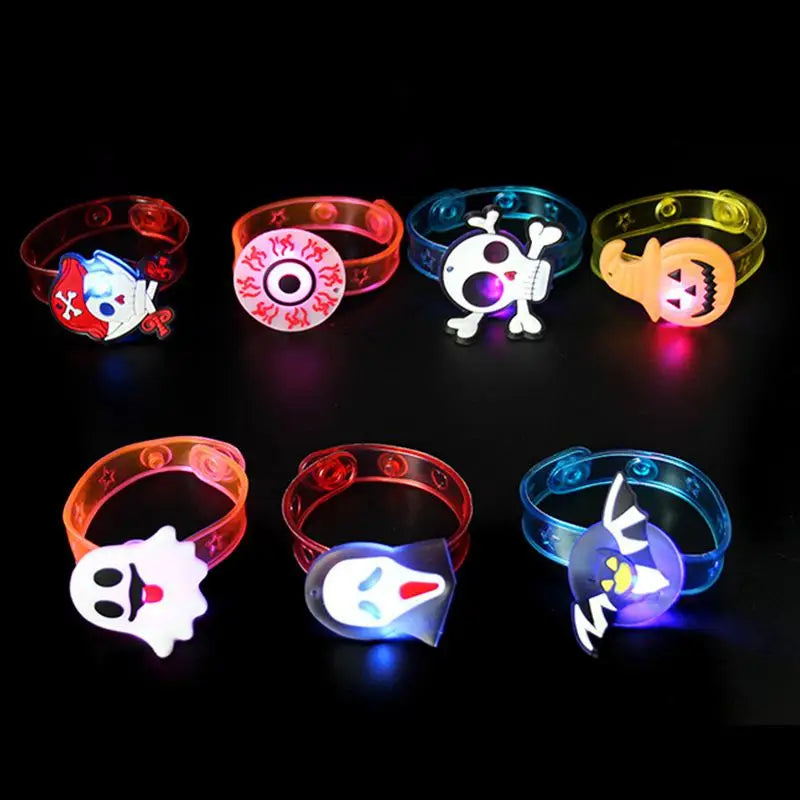 Colorful Halloween party bracelets and rings with spooky designs and LED lights for festive fun