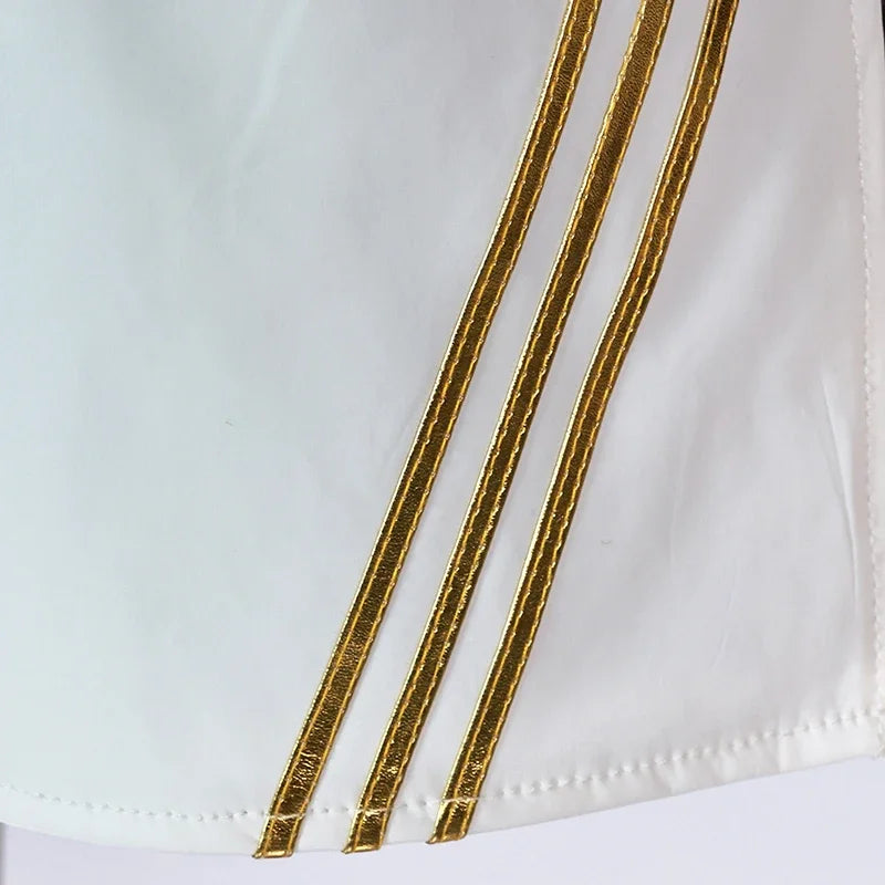 Close-up of the KPop demon hunter cosplay costume for girls featuring detailed gold stripe design