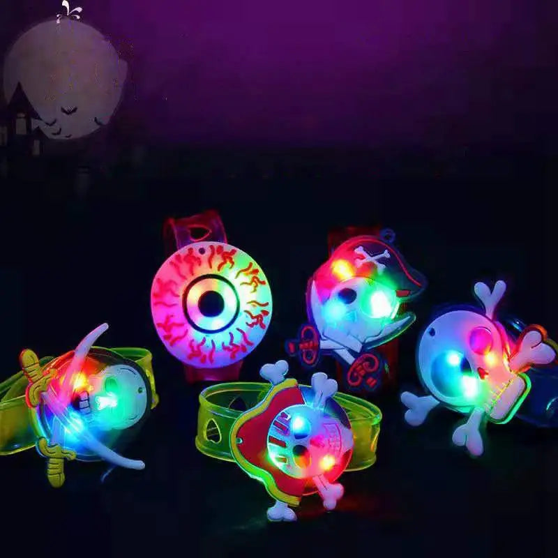 Colorful Halloween party bracelets and rings with glowing characters and designs for festive celebrations
