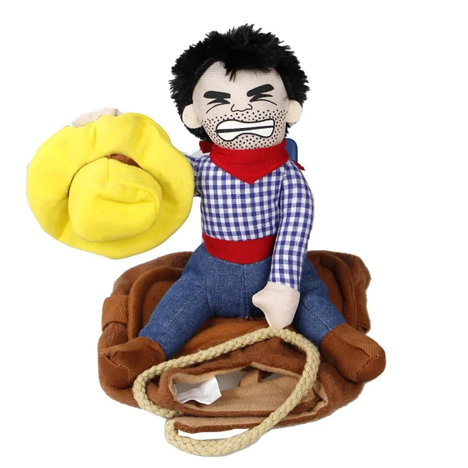 Cowboy dog costume for Halloween with a plush cowboy figure holding a hat and sitting on a saddle