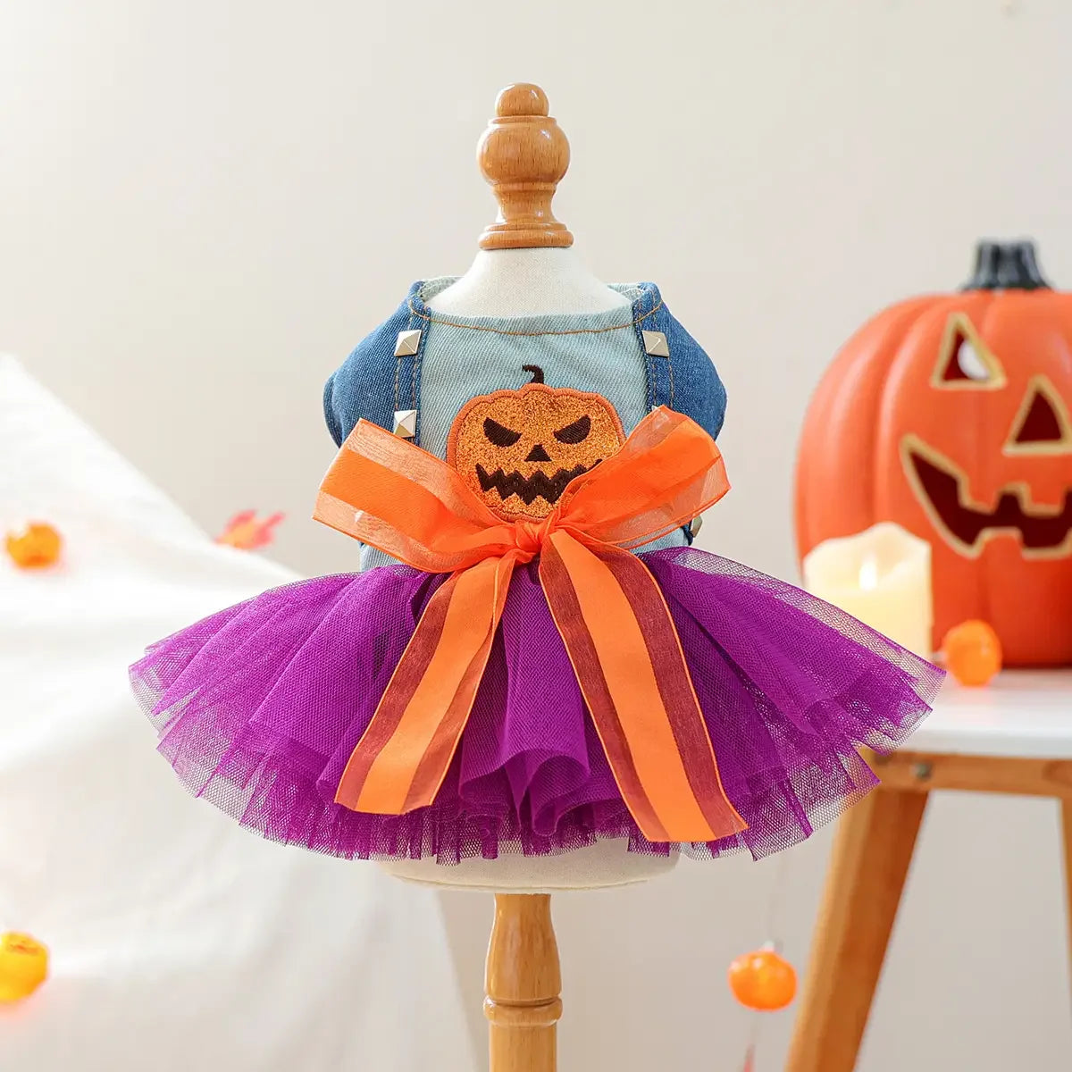 Cute Halloween pumpkin skirt for pets featuring a denim top and a tulle skirt with a pumpkin print