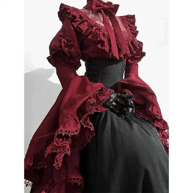 Marie Antoinette Victorian cosplay dress in burgundy and black with intricate lace details and flowing sleeves