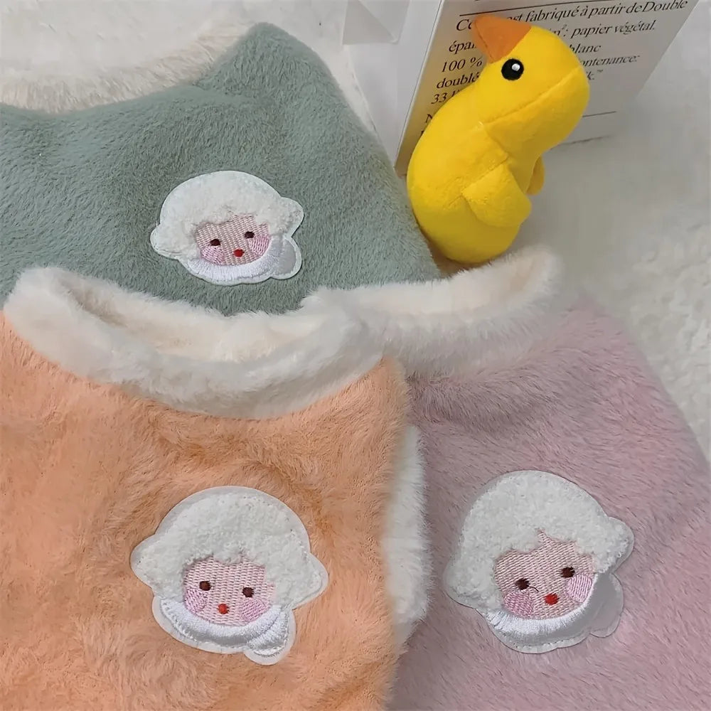 Soft fleece cat vest for winter featuring cute sheep patches in pastel colors