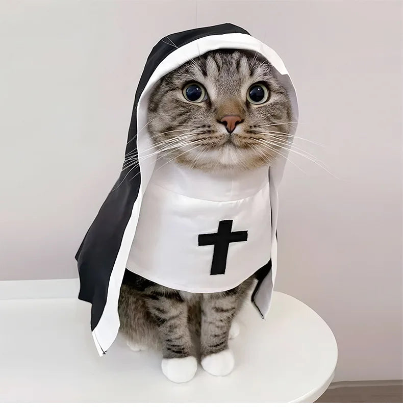 Adorable cat in a nun costume for cats and small dogs with a black and white design featuring a cross