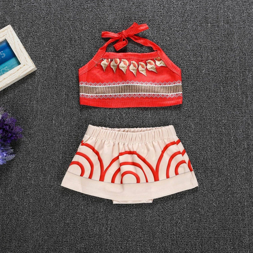 Moana costume for little girls featuring a red top and beige skirt with circular patterns