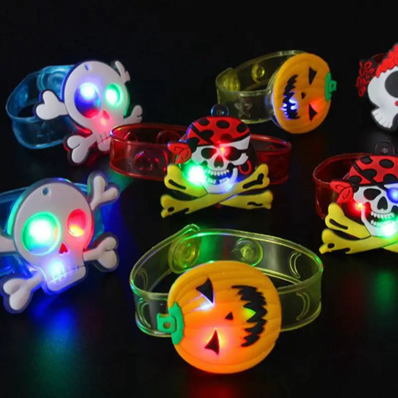 Colorful Halloween party bracelets and rings with LED lights featuring skulls and pumpkins