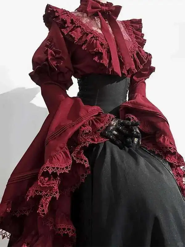 Marie Antoinette Victorian cosplay dress in burgundy with lace details and dramatic sleeves