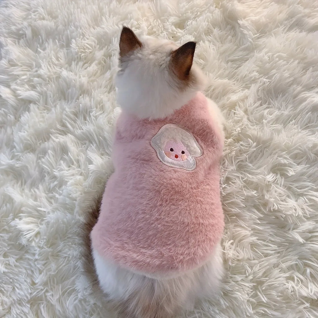 Adorable pink soft fleece cat vest for winter with a cute face patch for cozy warmth