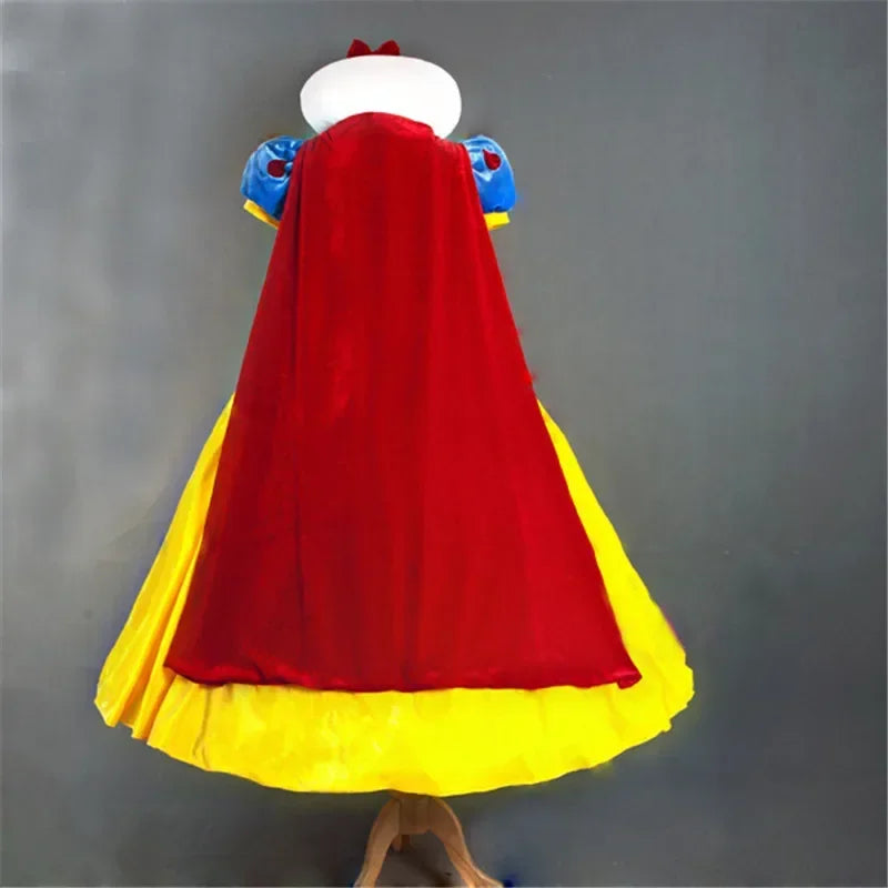 Adult Snow White costume for women featuring a red cape and vibrant yellow dress