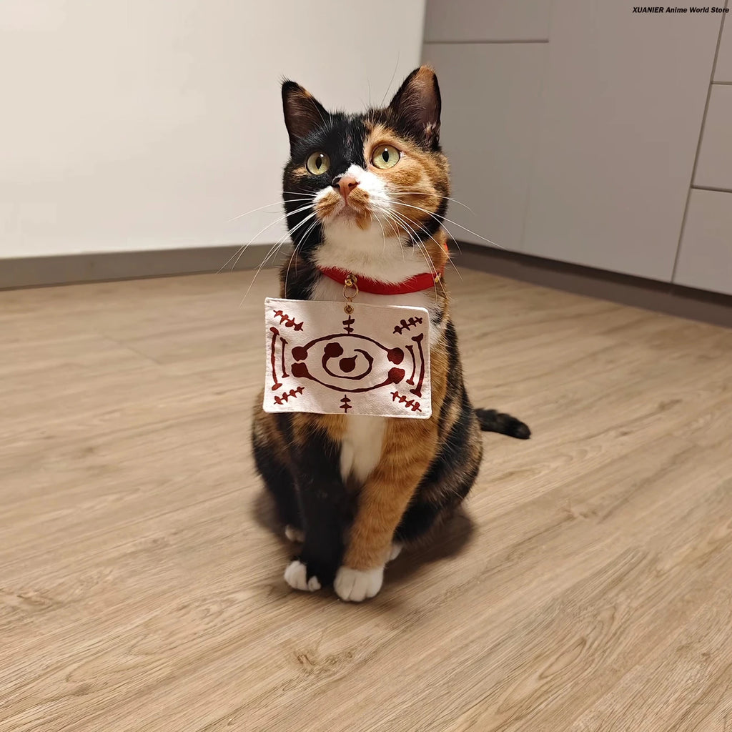 Cute calico cat wearing an anime cat costume for pets, featuring detailed design and collar.
