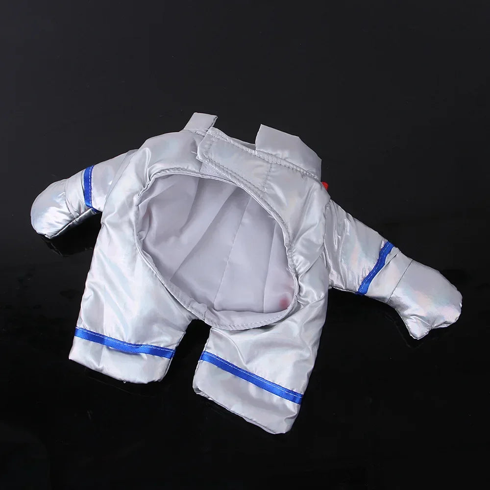 Silver astronaut pet costume with blue accents for dogs and cats on a black background