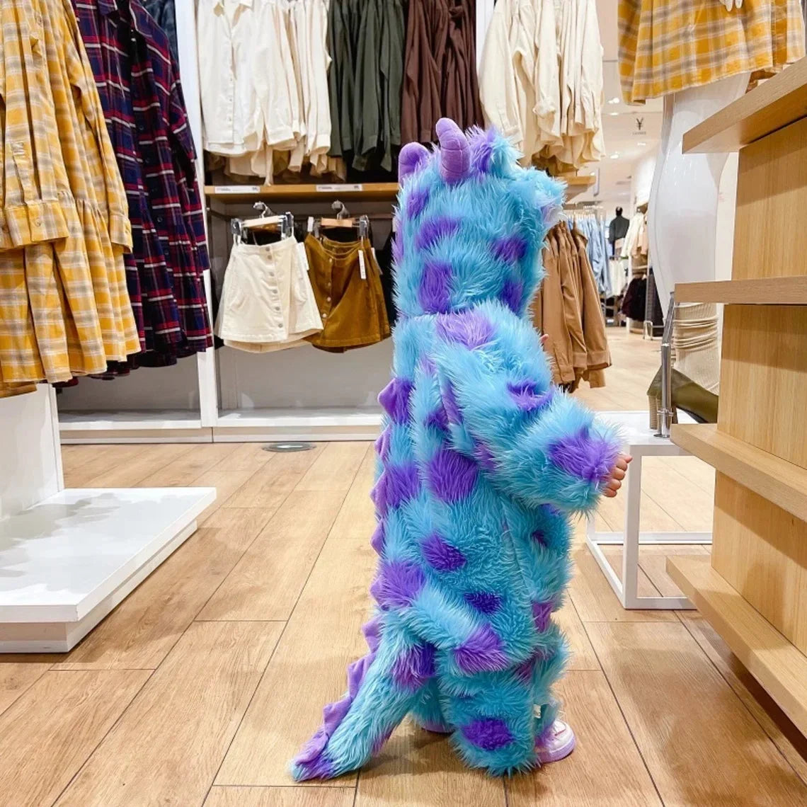 Adorable baby monster onesie Halloween costume in blue and purple, perfect for festive celebrations