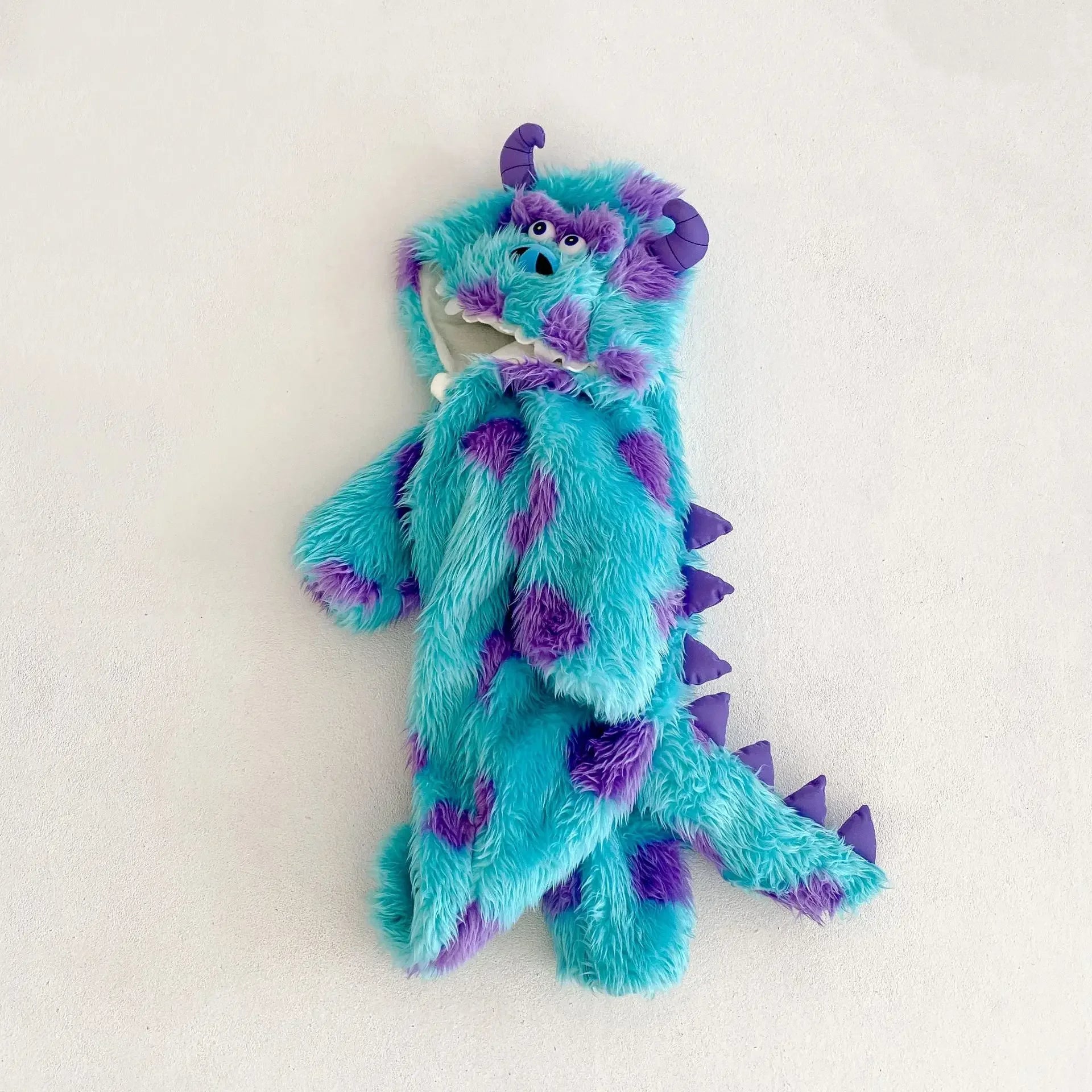 Baby monster onesie Halloween costume in turquoise and purple furry fabric with spiky details