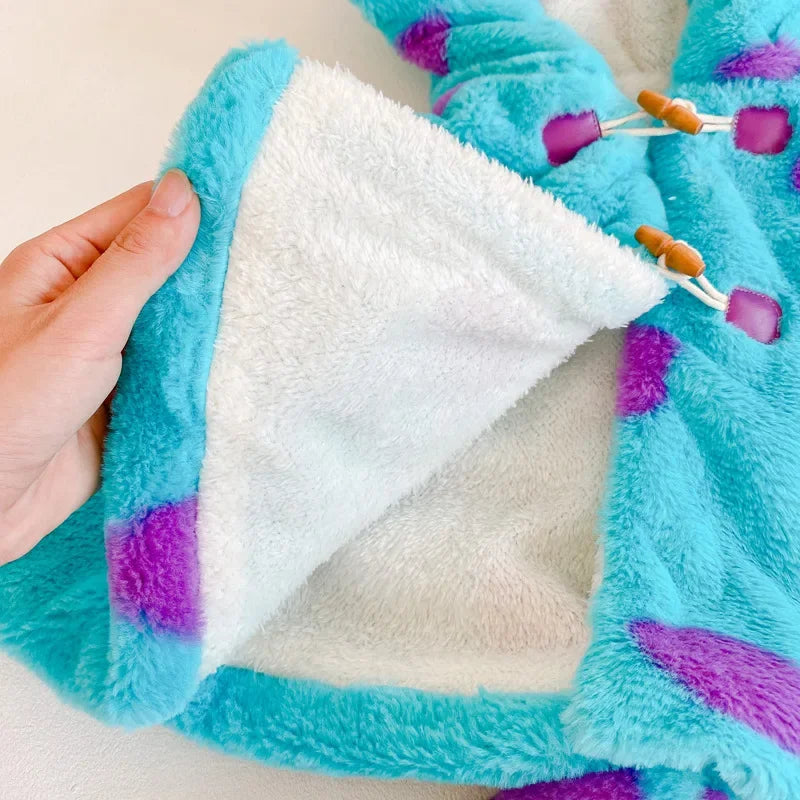 Interior view of the baby monster onesie Halloween featuring soft and fluffy lining for comfort