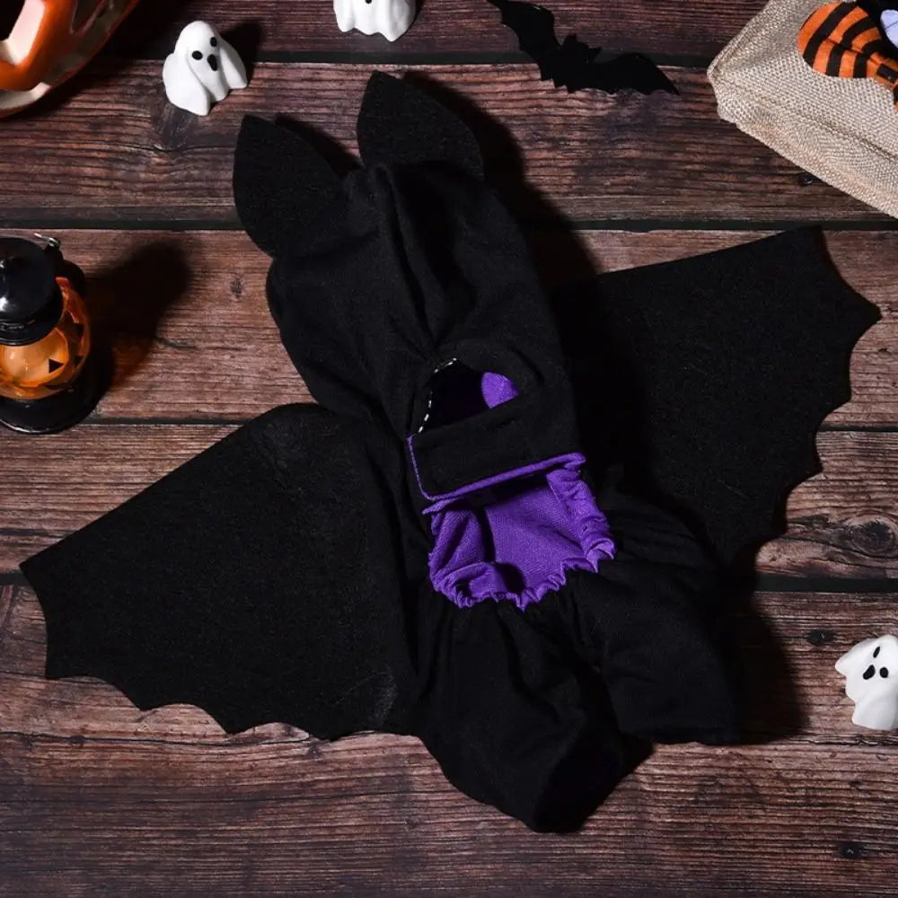 Black bat costume for small dogs with wings and hoodie design for Halloween festivities