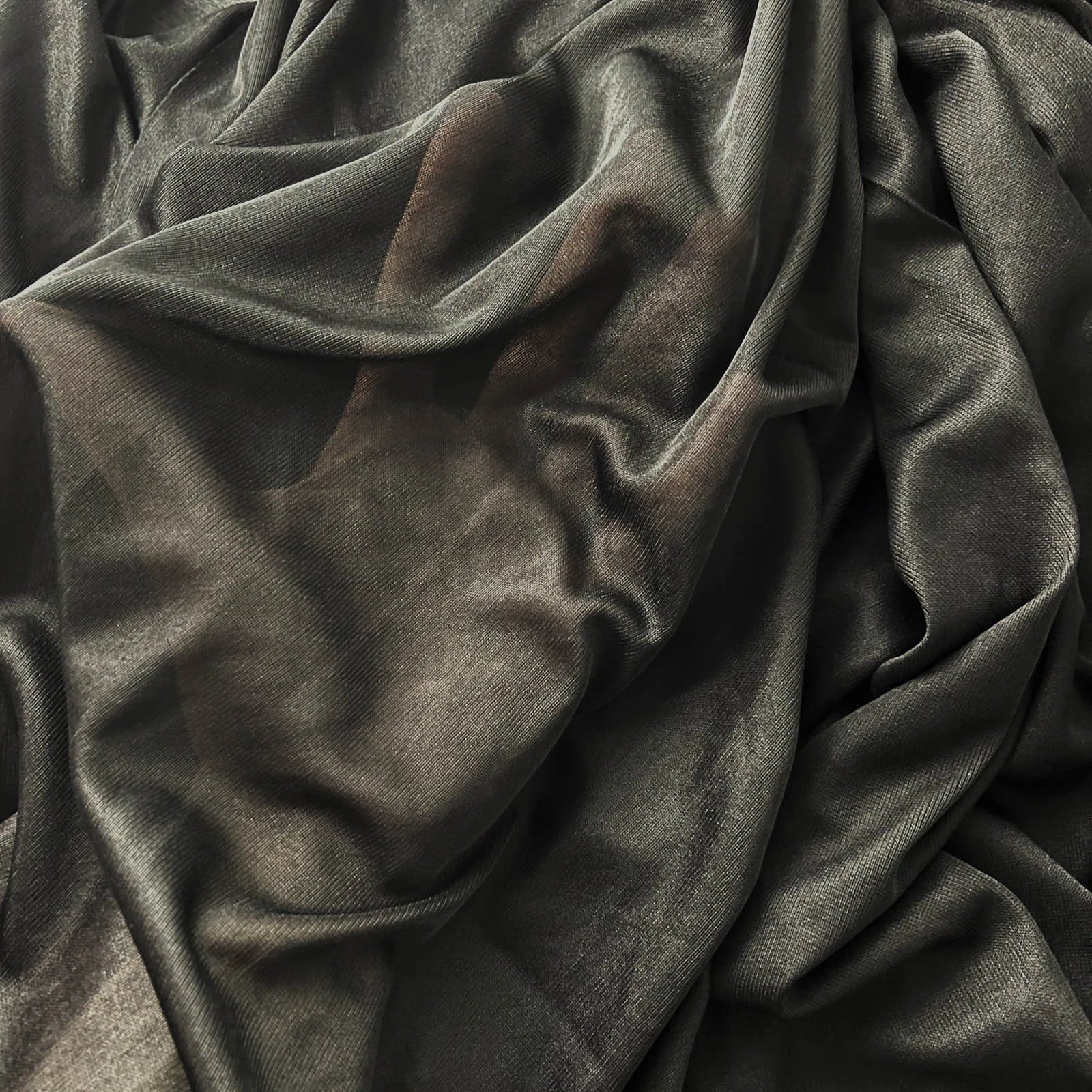 Soft black cape robe Halloween costume fabric draped elegantly for stylish spooky attire