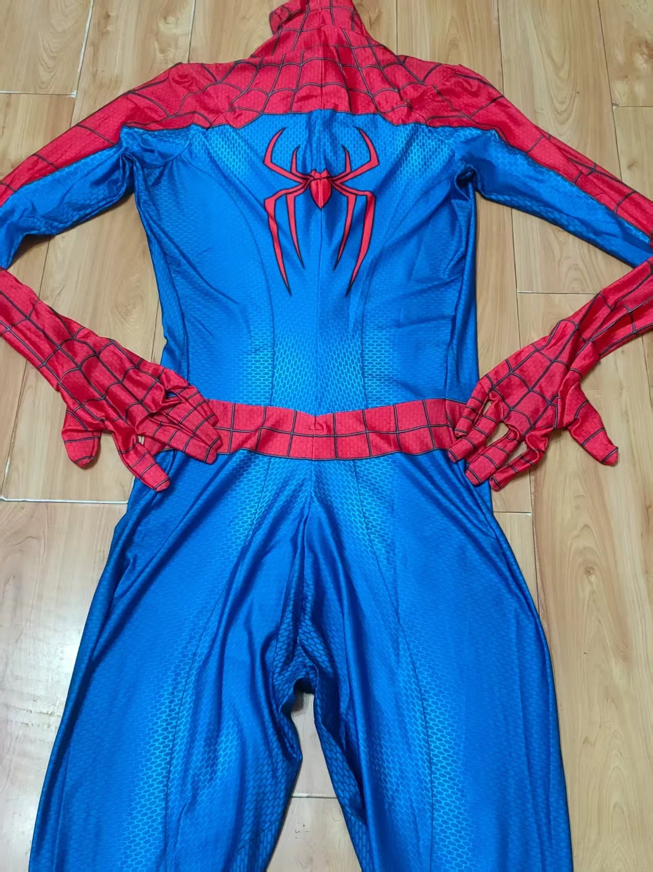 Brand New Day Spiderman costume featuring a blue and red design with spider emblem and gloves