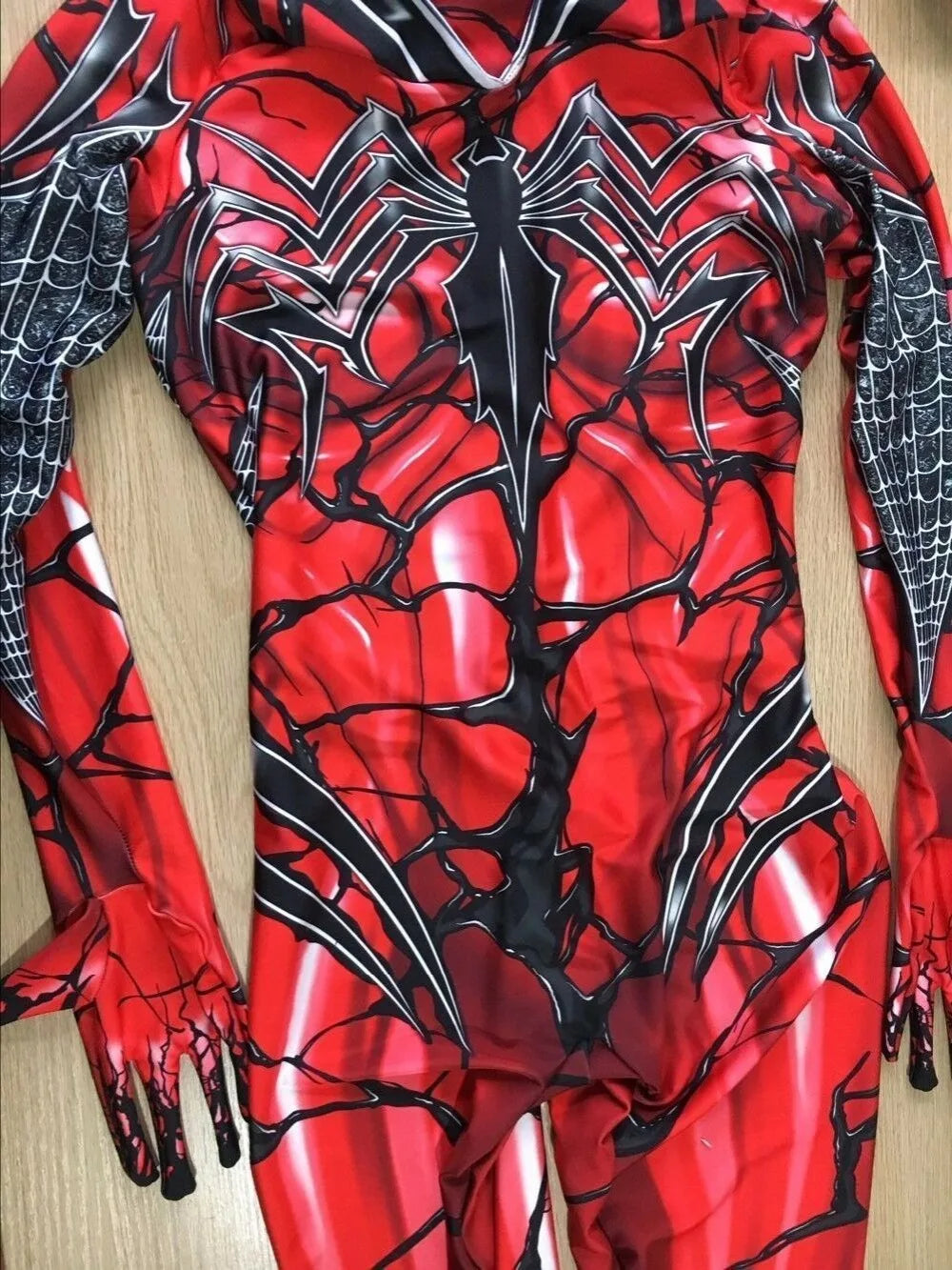 Carnage superhero Costume for Adults n Kids featuring a vibrant red design with spider web details