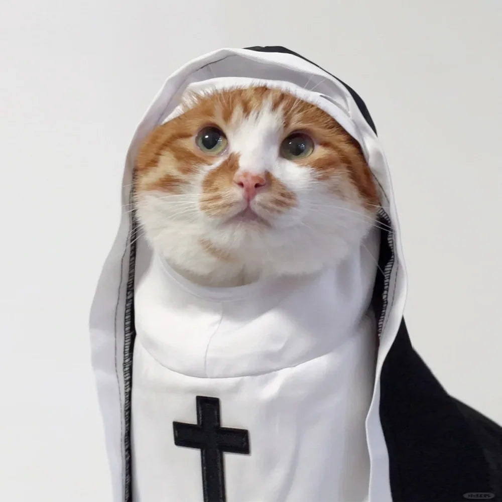 Cat in a nun costume for cats and small dogs, featuring a black and white design with a cross