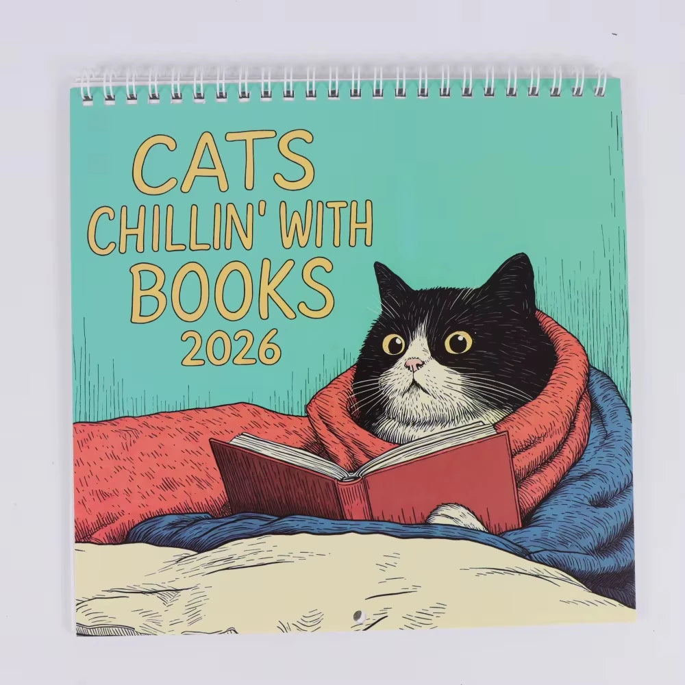 Cats Chillin' with Books 2026 Calendar featuring a cat reading on a cozy blanket
