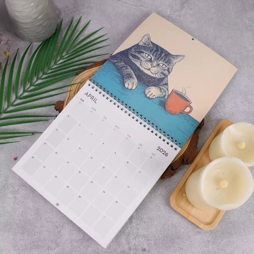 Cats with books calendar featuring an illustration of a gray cat relaxing with a cup of tea