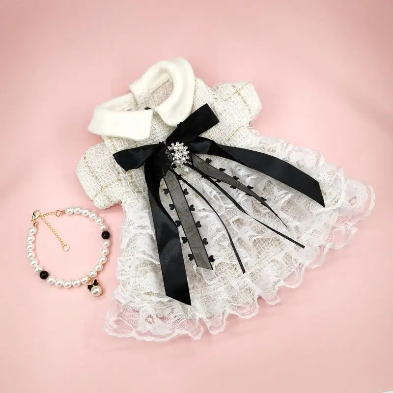 Elegant Zoomies & Co Christmas pet dress for cats and dogs featuring lace and a stylish black bow