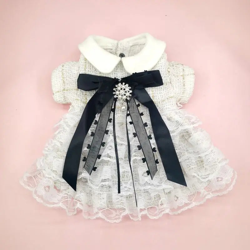 Elegant Christmas pet dress for cats and dogs with lace details and a bow for festive occasions