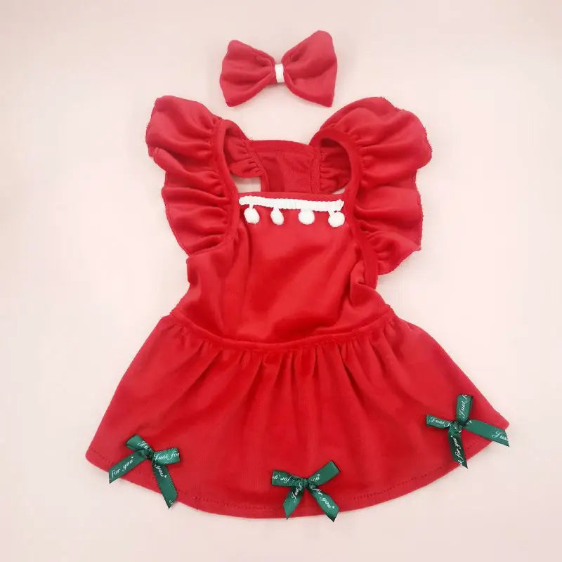 Festive red Christmas pet dress for cats and dogs with ruffle sleeves and green bows