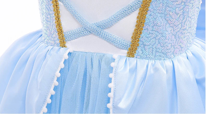 Close-up of a Cinderella princess dress for girls featuring blue fabric and shimmering details