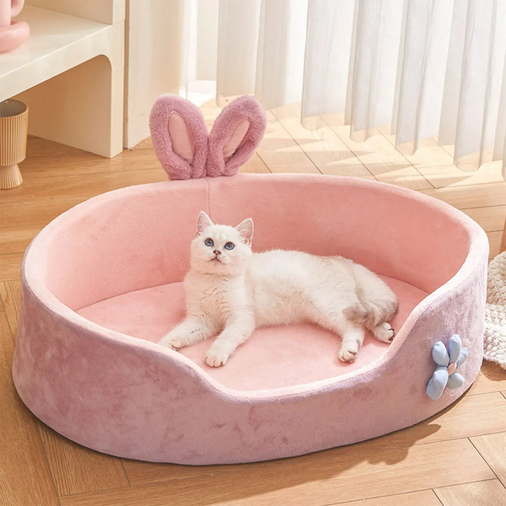 CloudNest Detachable Pet Bed in pink with bunny ears, perfect for pet relaxation and comfort