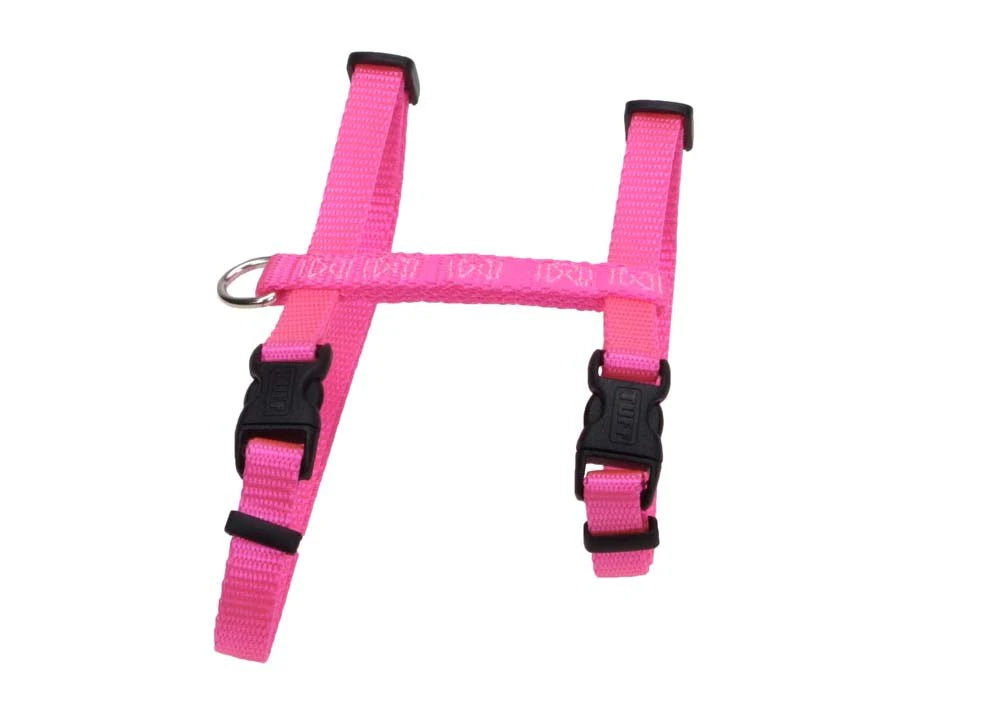Bright pink adjustable dog harness with black buckles and metal ring for leash attachment
