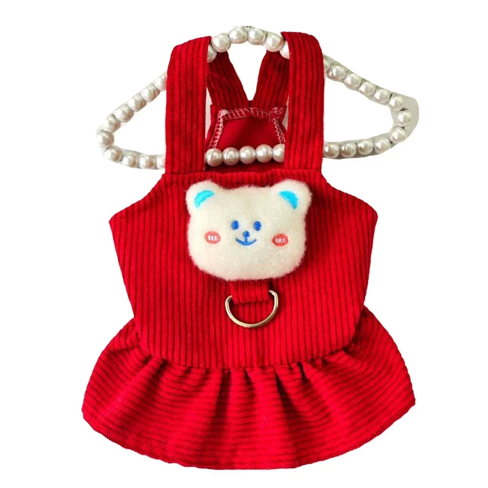 Red corduroy dog dress for small dogs with a cute bear face and pearl accents