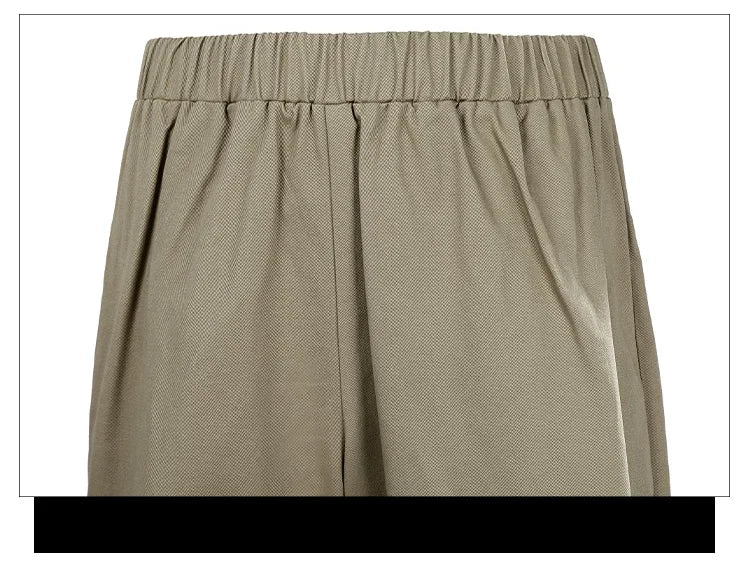 High-waisted beige pants featuring pleats for Arcane Ekko cosplay costume from Zoomies & Co