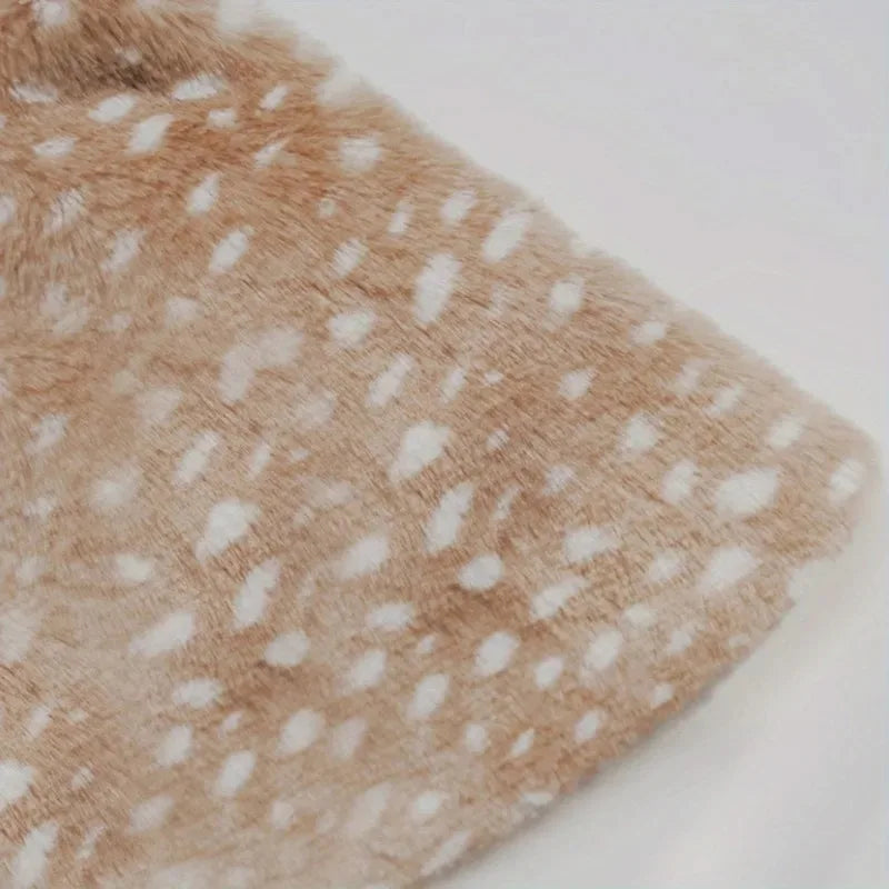 Close-up of soft fabric with spots, ideal for a cute dog reindeer costume for puppies