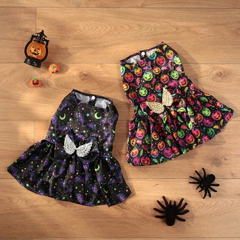 Two cute Halloween costumes for medium dogs featuring colorful spooky designs and butterfly embellishments