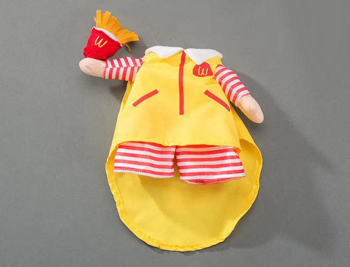 Cute Halloween costumes for pets featuring a yellow outfit with red stripes and a fries accessory