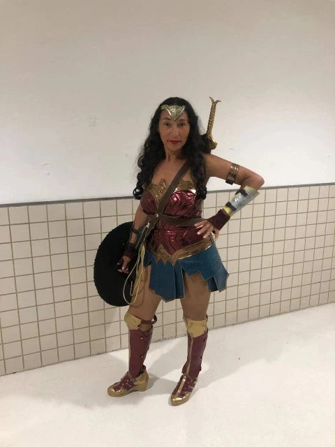Diana cosplay costume for women featuring a warrior dress, shield, and accessories for fans of the character