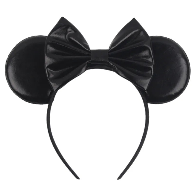 Disney Halloween ear headband with glossy black ears and a stylish bow for festive celebrations