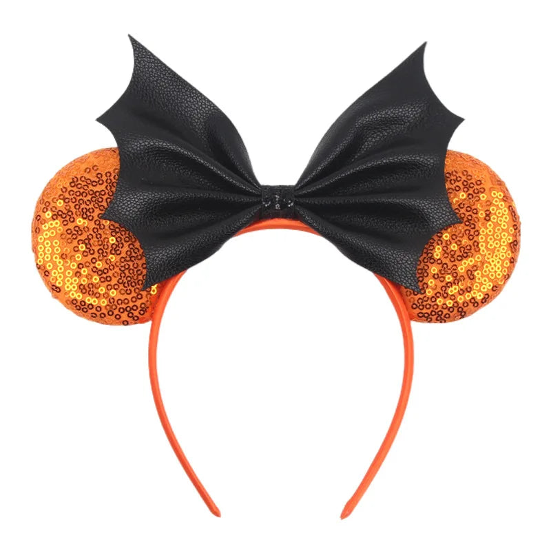 Disney Halloween ear headband with sequined orange ears and a black bat bow for festive celebrations