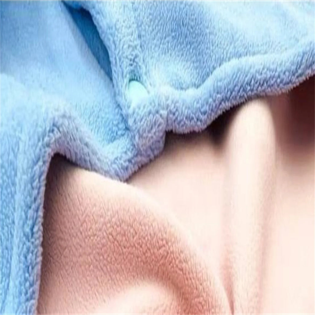 Soft fabric close-up of a dog elephant costume in blue and pink for adorable pet dress-up