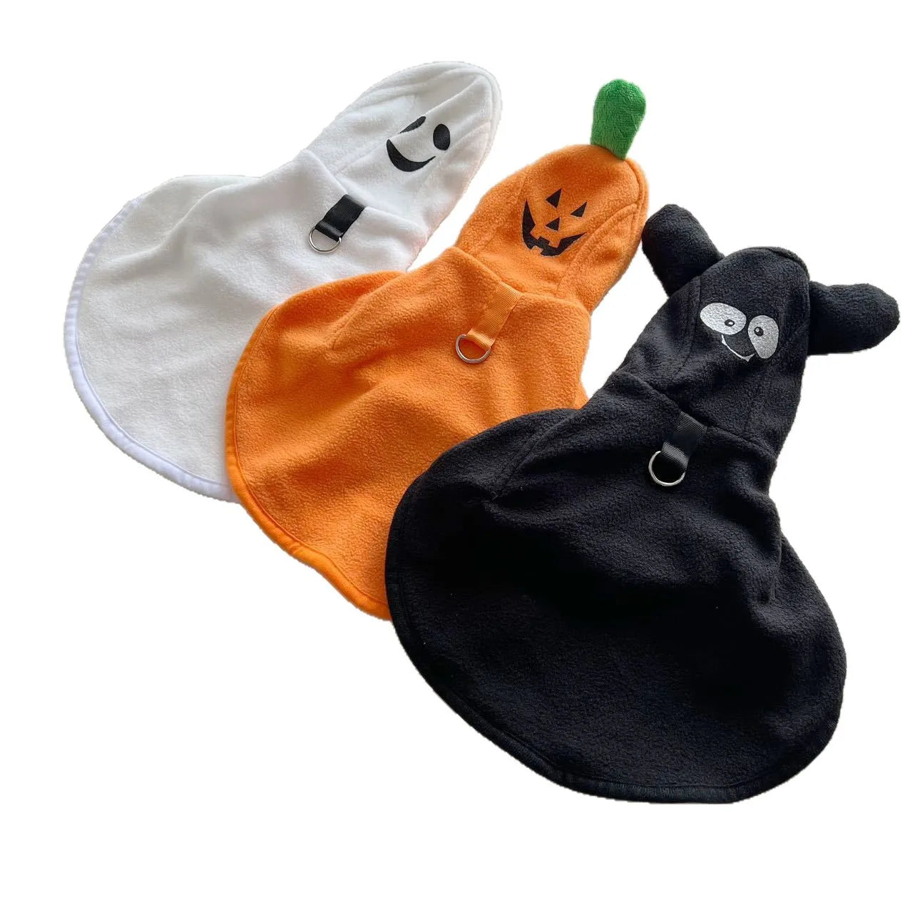 Set of three dog Halloween ghost capes in white, orange, and black for festive pet costumes