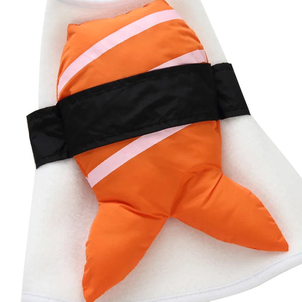 Dog kimono chef costume in vibrant orange and black resembling sushi with stripes