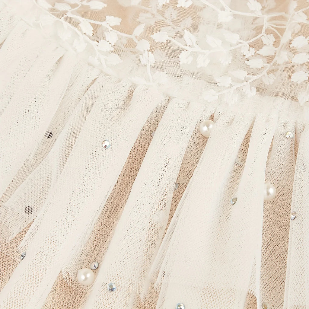 Elegant dog wedding dress featuring lace and tulle with decorative sequins for special occasions