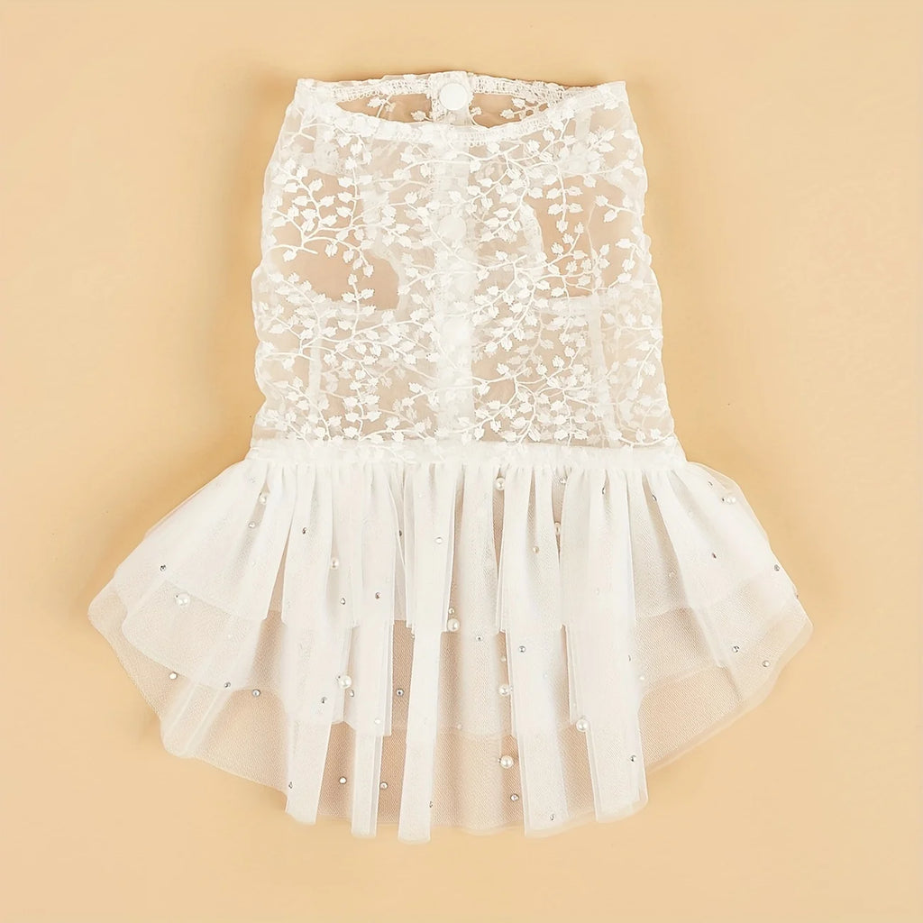 Elegant dog wedding dress in white with floral lace and a ruffled skirt, perfect for special occasions