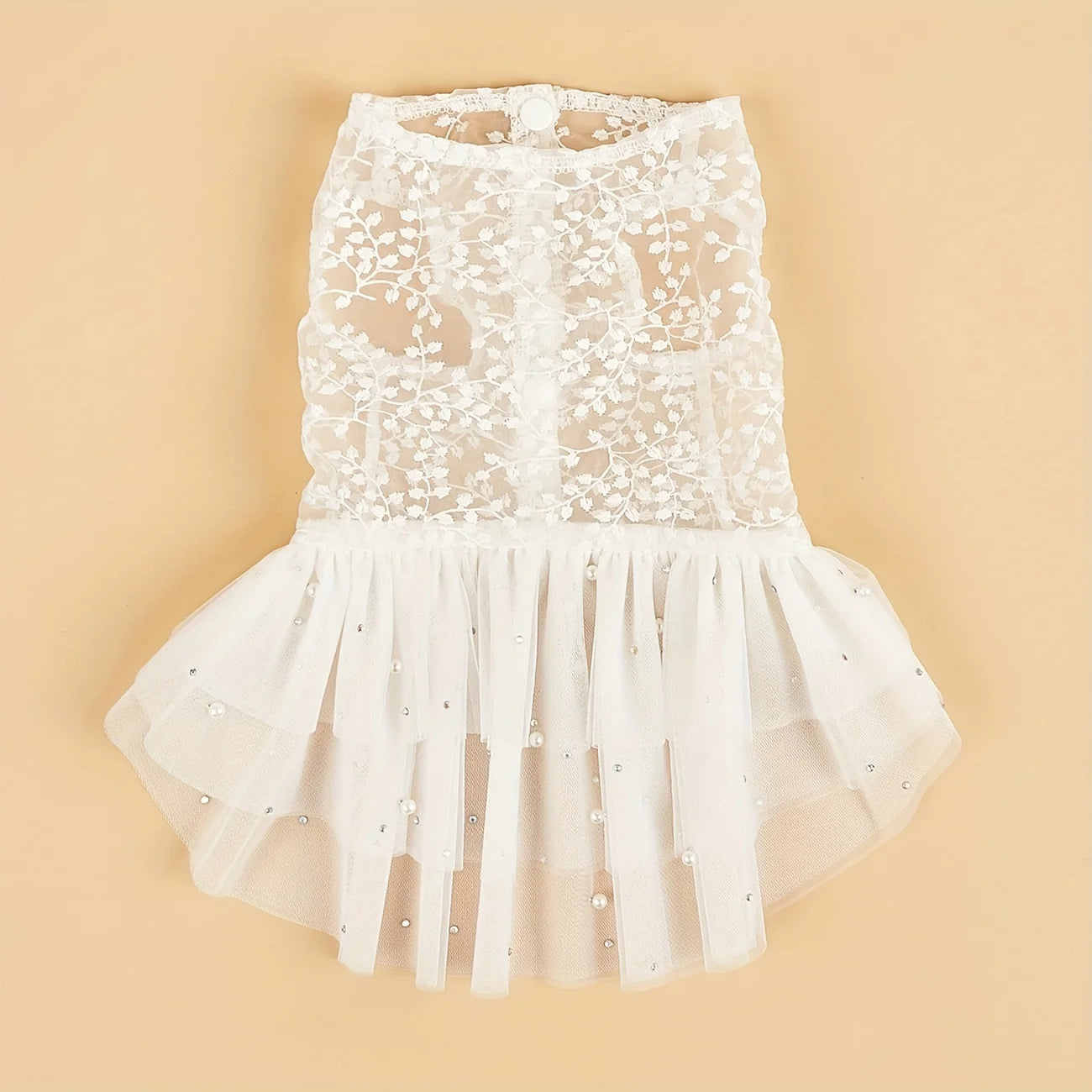 Elegant dog wedding dress in white with floral lace and a ruffled skirt, perfect for special occasions