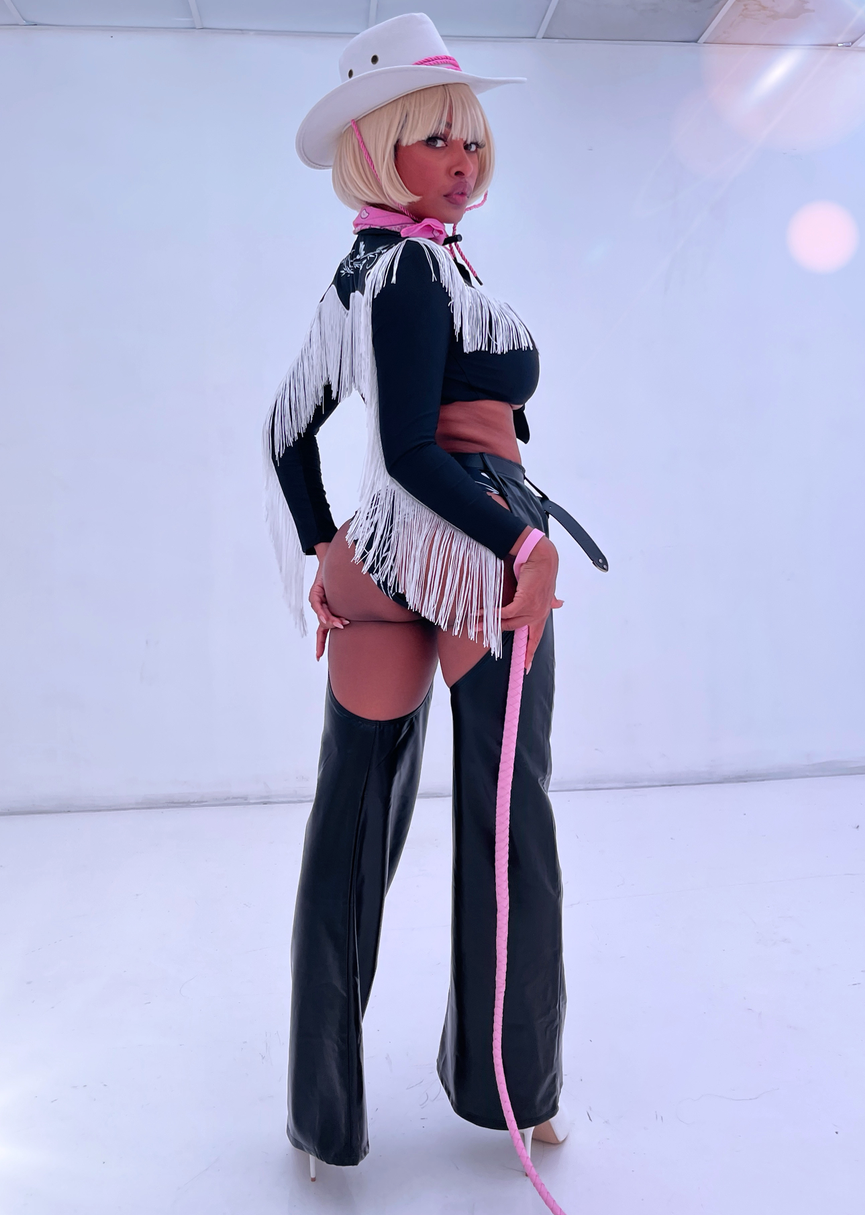 Lorlie doll movie character Halloween costume featuring fringe details and a stylish hat