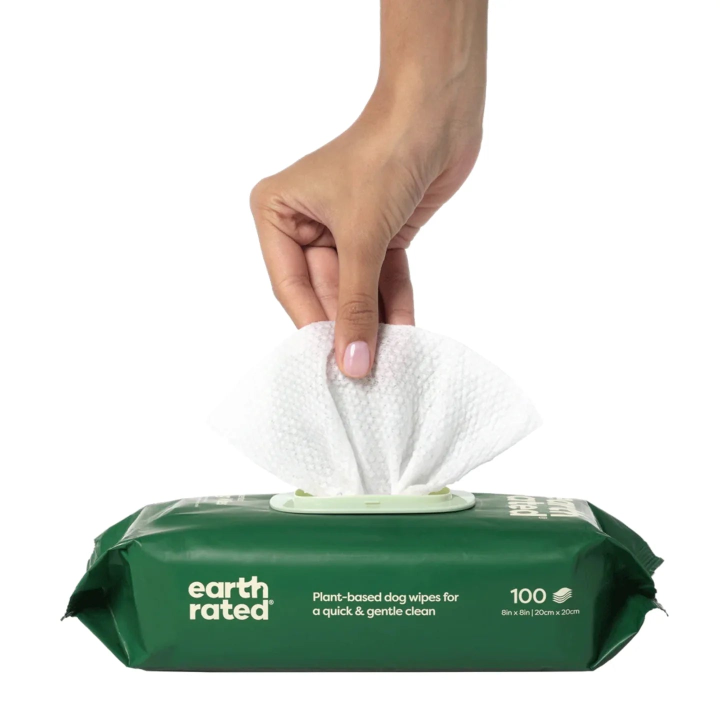 Hand pulling a wipe from green package of earth rated pet wipes plant based dog wipes