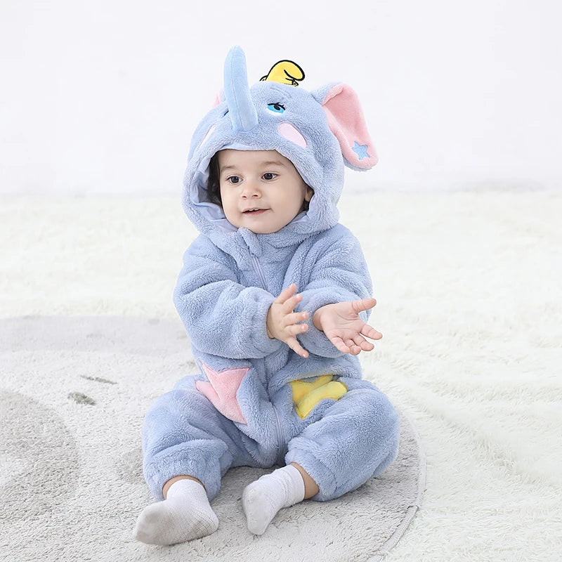 Cute baby in a fluffy elephant baby romper costume with a hood and colorful stars
