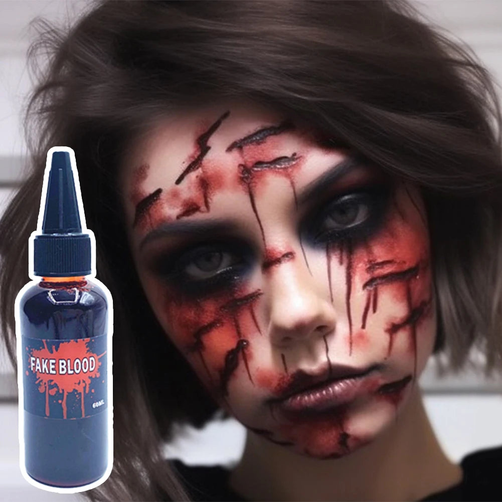 Zoomies & Co Fake Blood for Pets Halloween Cosplay in a bottle next to a spooky makeup application