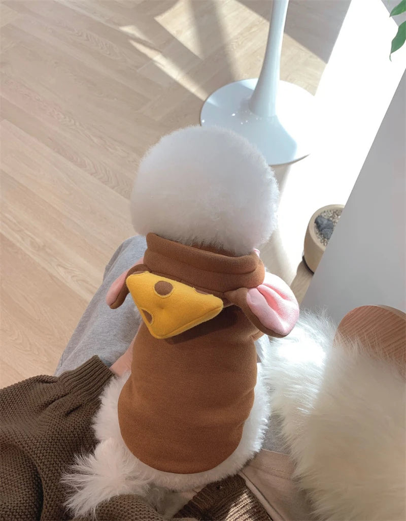 Cute dog wearing a funny animal costume for pets with cheese slice and ear details
